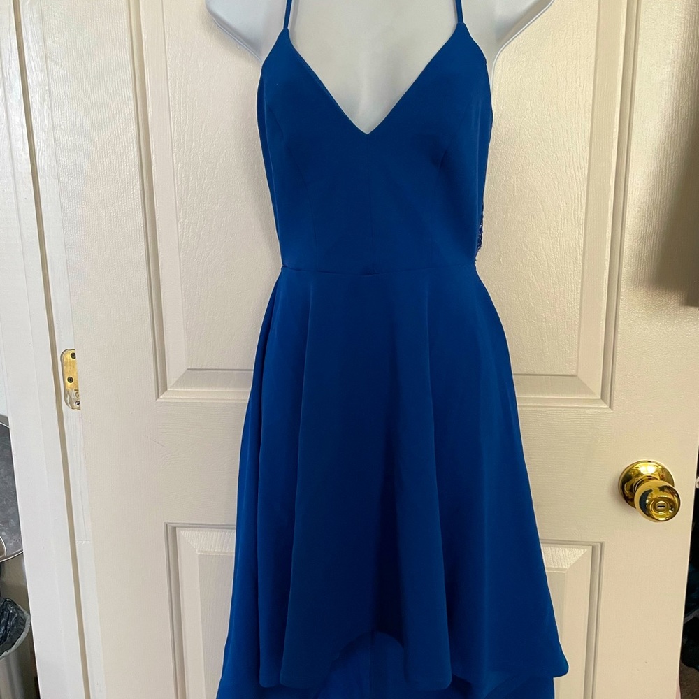 Beautiful navy blue dress. Worn once to a wedding. Size 5/6 or small. Smoke free